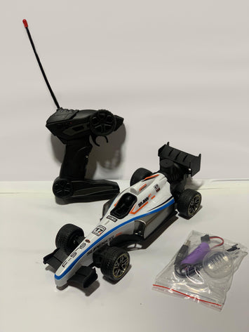 1:14 Remote Control Formula Racing Car – Rechargeable High-Speed F1 Toy Car with Spray & Stylish Controller for Kids