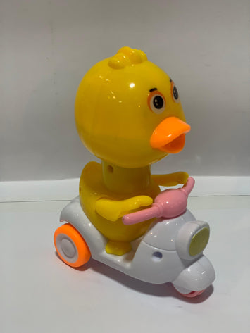 Cute Duck on Scooter Toy for Kids – Musical & Moving Cartoon Duckie Ride Toy (Battery Operated)