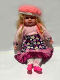 Soft Baby Doll with Winter Cap & Floral Dress – Realistic Look, Cuddly Toy for Girls (Pink & Purple Outfit)