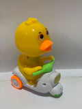 Cute Duck on Scooter Toy for Kids – Musical & Moving Cartoon Duckie Ride Toy (Battery Operated)